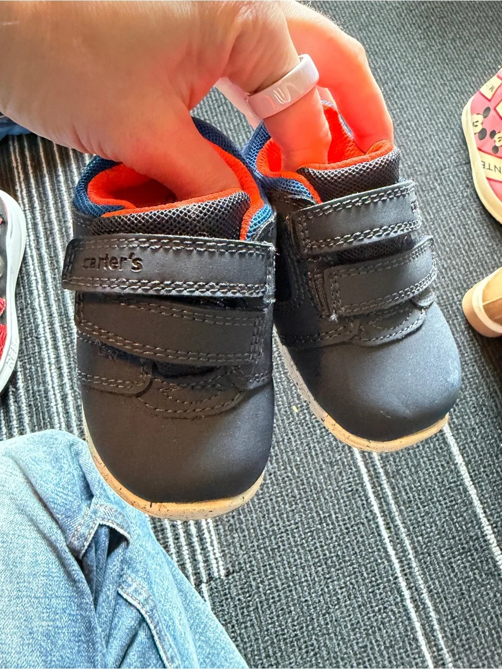 2 pairs of  baby Navy Sneakers w/Orange Lining. Plus bonus navy Velcro sneaker